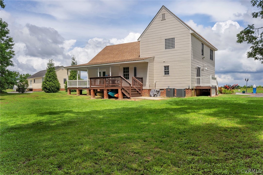 14498 Scotts Lane Carson, VA 23830 - Photo 40 of 44 a view of a house with a big yard and large trees
