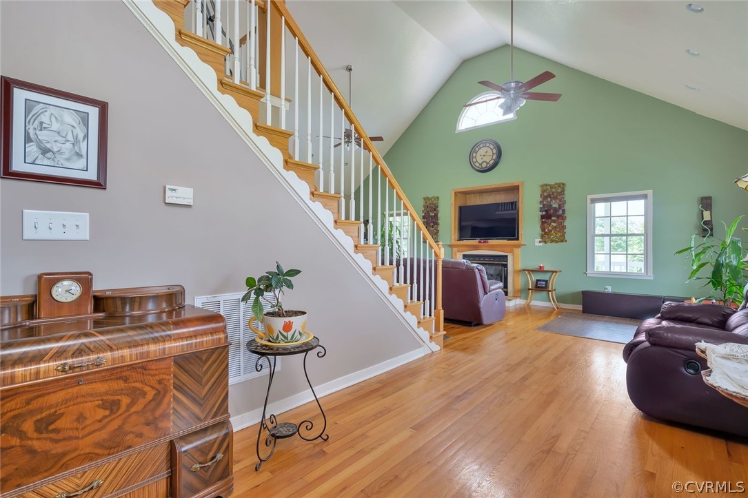 14498 Scotts Lane Carson, VA 23830 - Photo 10 of 44 a living room with fireplace furniture and a wooden floor