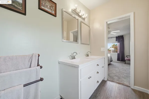 a view of a balcony with wooden floor