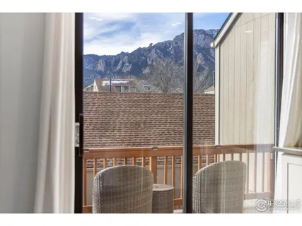 a view of a balcony with a door
