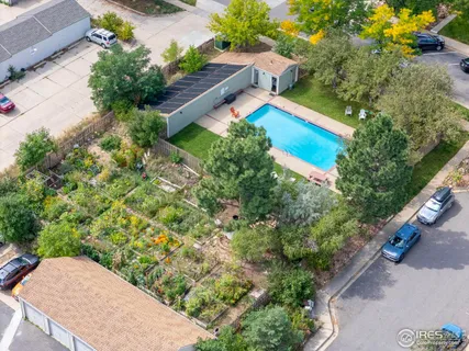 an aerial view of residential houses and outdoor space