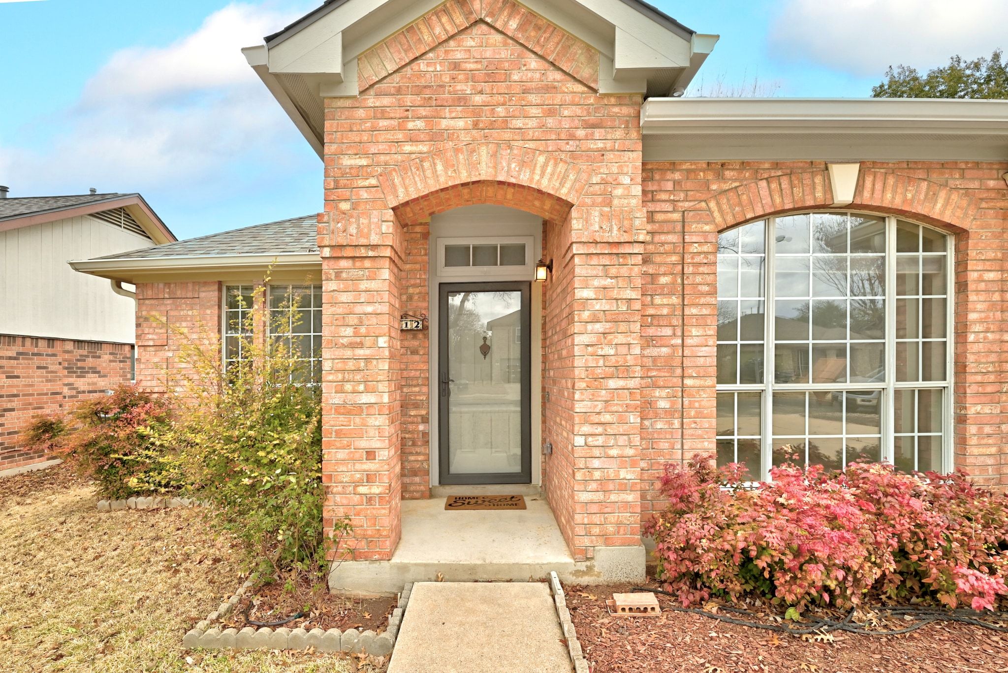 6412 Sailing Breeze Trail Austin, TX 78744 - Photo 1 of 18 a front view of a house