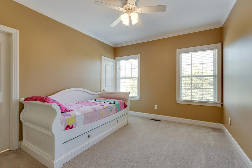 1206 White Rock Road Spring Hill, TN 37174 - Photo 16 of 30 a bed room with a bed and a window