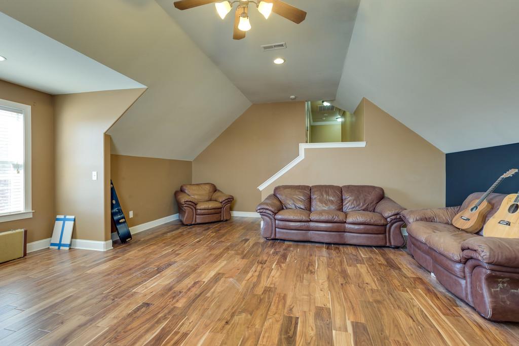 1206 White Rock Road Spring Hill, TN 37174 - Photo 20 of 30 a living room with furniture and a wooden floor
