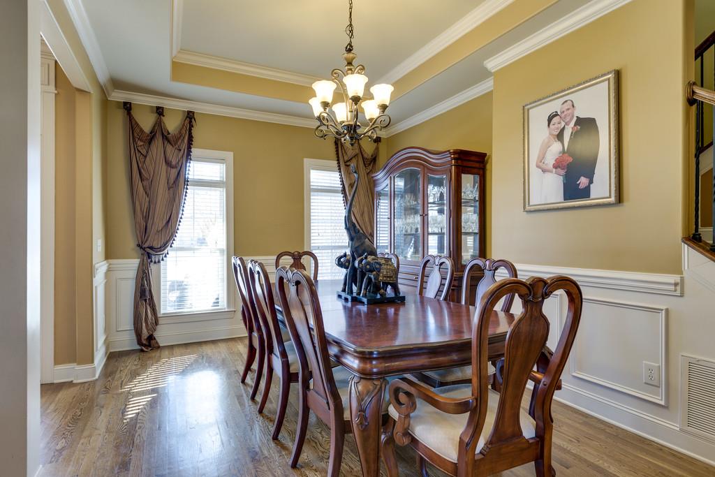 1206 White Rock Road Spring Hill, TN 37174 - Photo 5 of 30 a dining room with furniture and chandelier