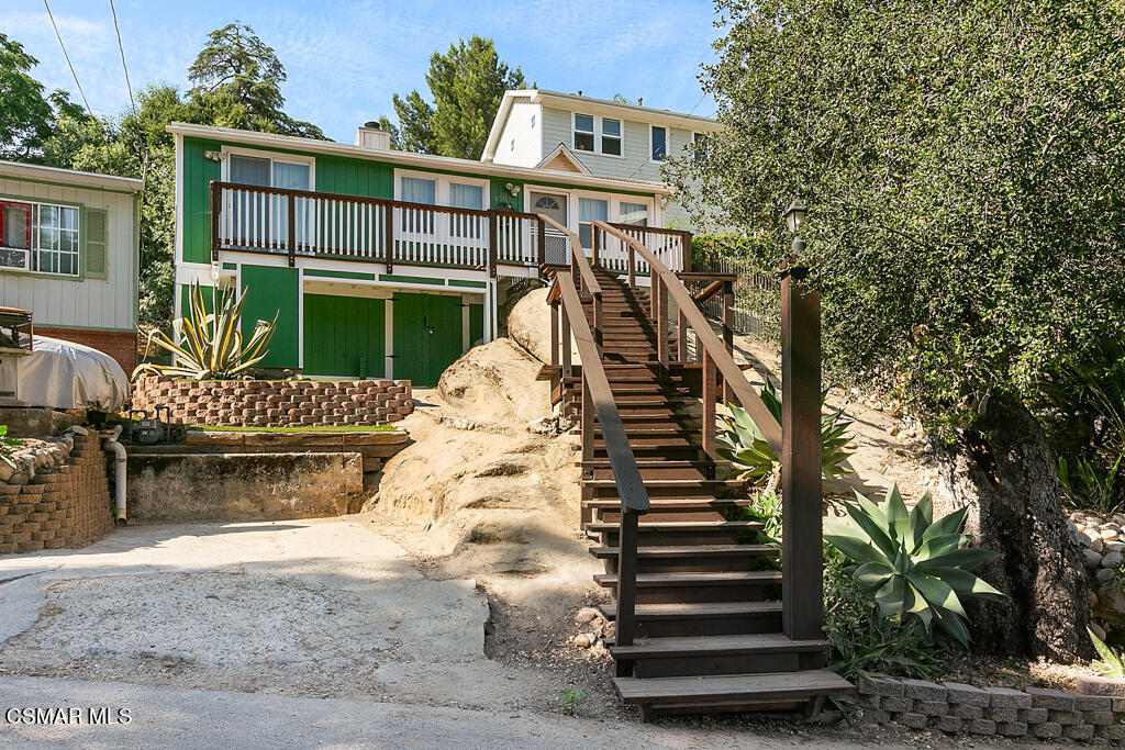 6314 Alta Vista Road Simi Valley, CA 93063 - Photo 1 of 39 a view of a house with backyard and sitting area