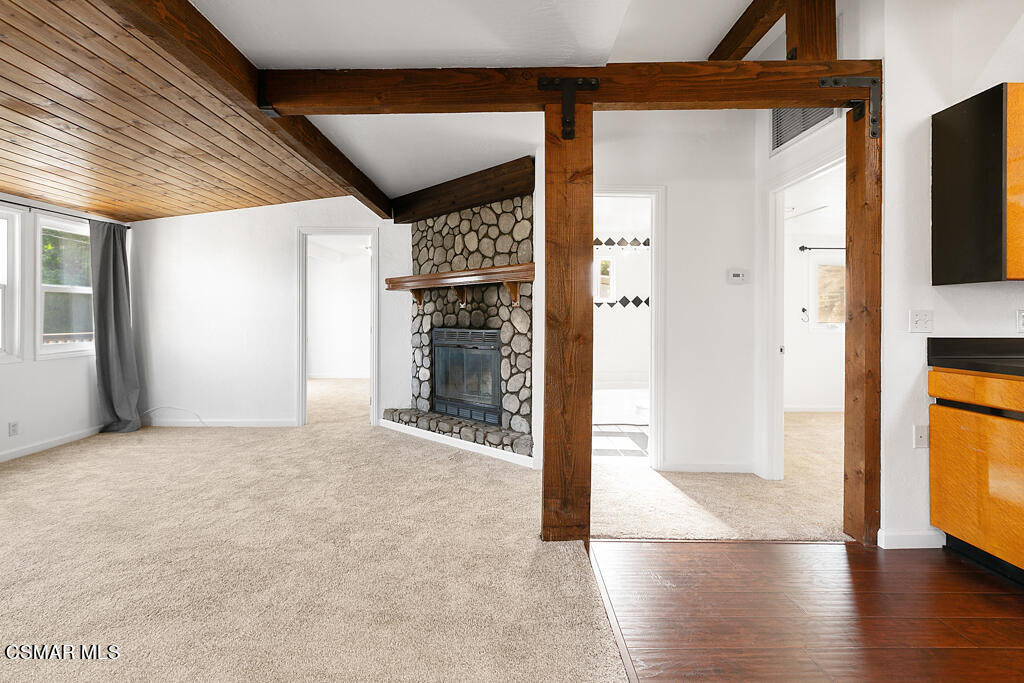 6314 Alta Vista Road Simi Valley, CA 93063 - Photo 14 of 39 an empty room with wooden floor and windows