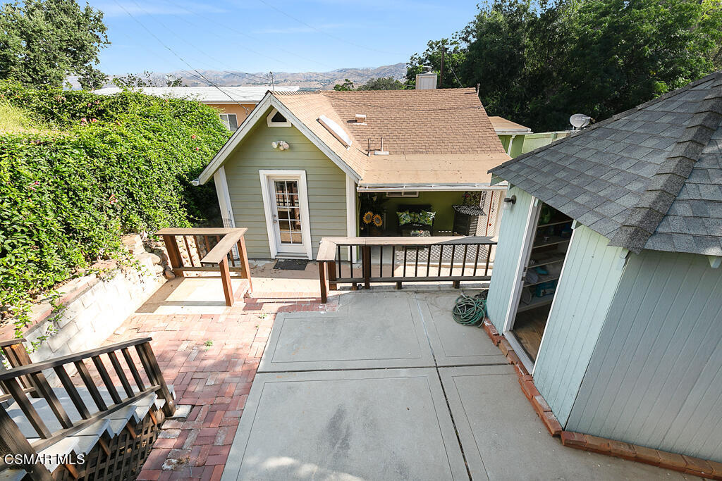 6314 Alta Vista Road Simi Valley, CA 93063 - Photo 27 of 39 a view of a house with backyard and porch