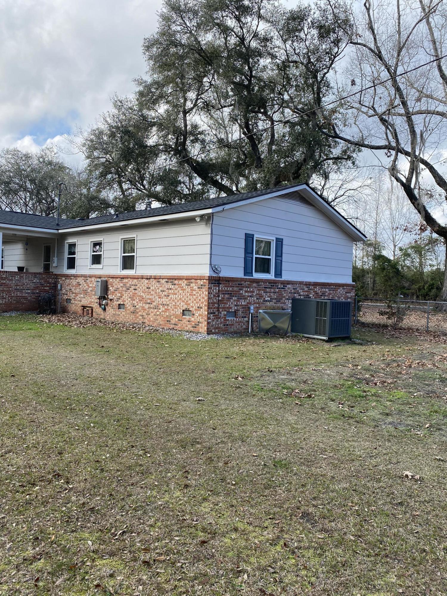 2966 Coolers Dairy Road Round O, SC 29474 - Photo 28 of 39 House side angle with HVAC