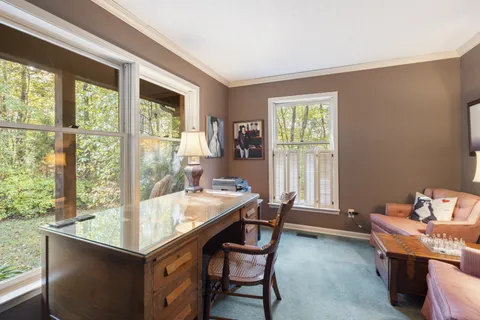 a kitchen with stainless steel appliances a stove refrigerator sink and cabinets
