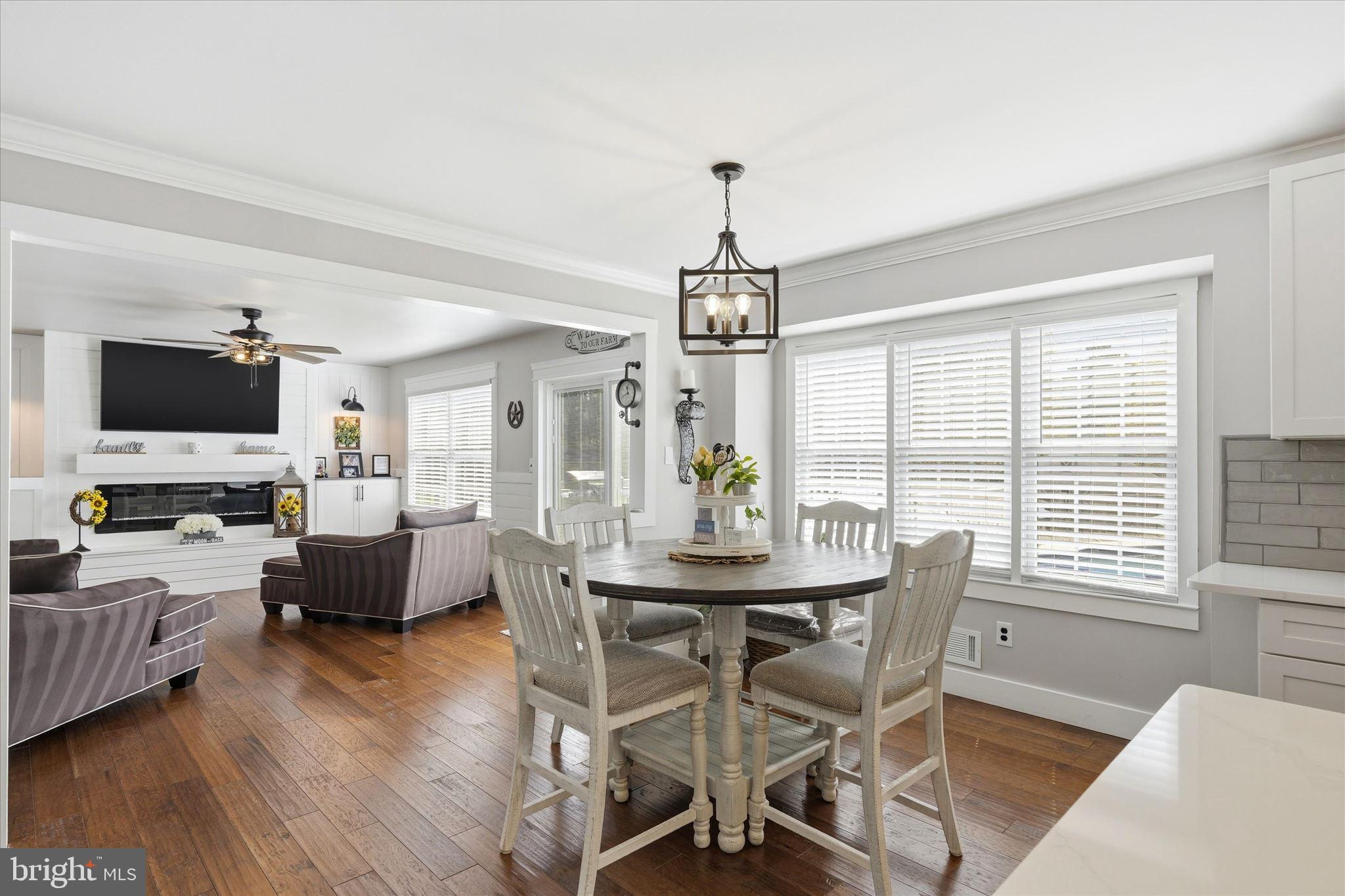 176 Warren Grove Road Barnegat, NJ 08005 - Photo 22 of 71 a view of a dining room with furniture window and wooden floor