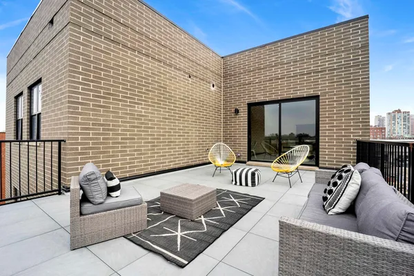 a building outdoor space with patio furniture