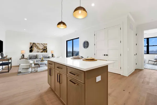 a kitchen with a sink and cabinets