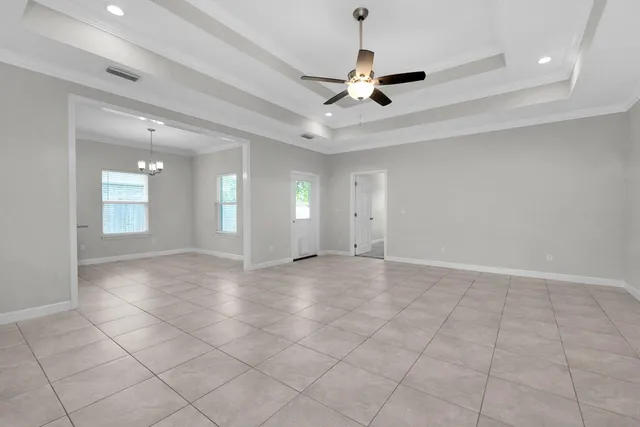 a kitchen with stainless steel appliances granite countertop a sink refrigerator and cabinets
