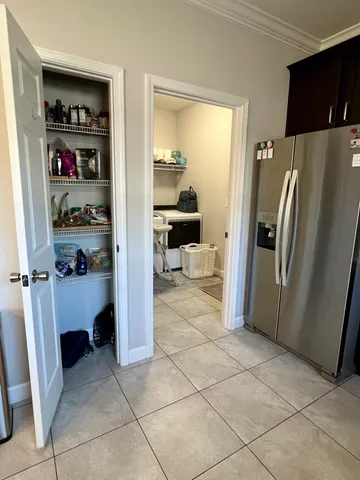a bathroom with a shower and a bath tub