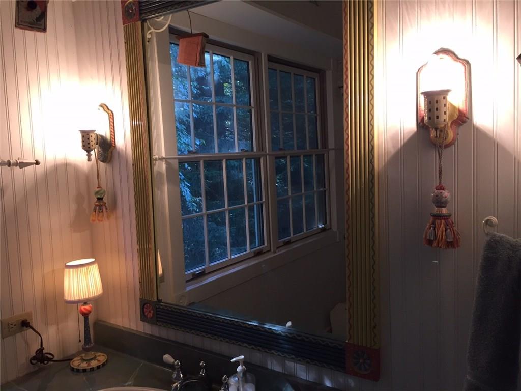 1690 Old Linn Run Road Rector, PA 15677 - Photo 19 of 25 Main Bathroom, McKenzie Childs Sconces and tassels. Handpainted mirror.