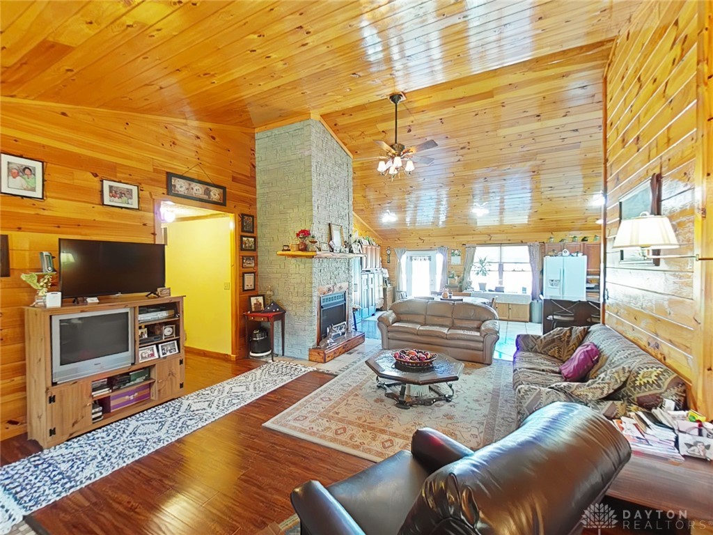 748 Inlow Avenue Peebles, OH 45660 - Photo 8 of 61 This inviting space features natural wood accents and a cozy fireplace, creating a warm atmosphere.