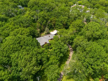 a view of a big yard with lots of buildings