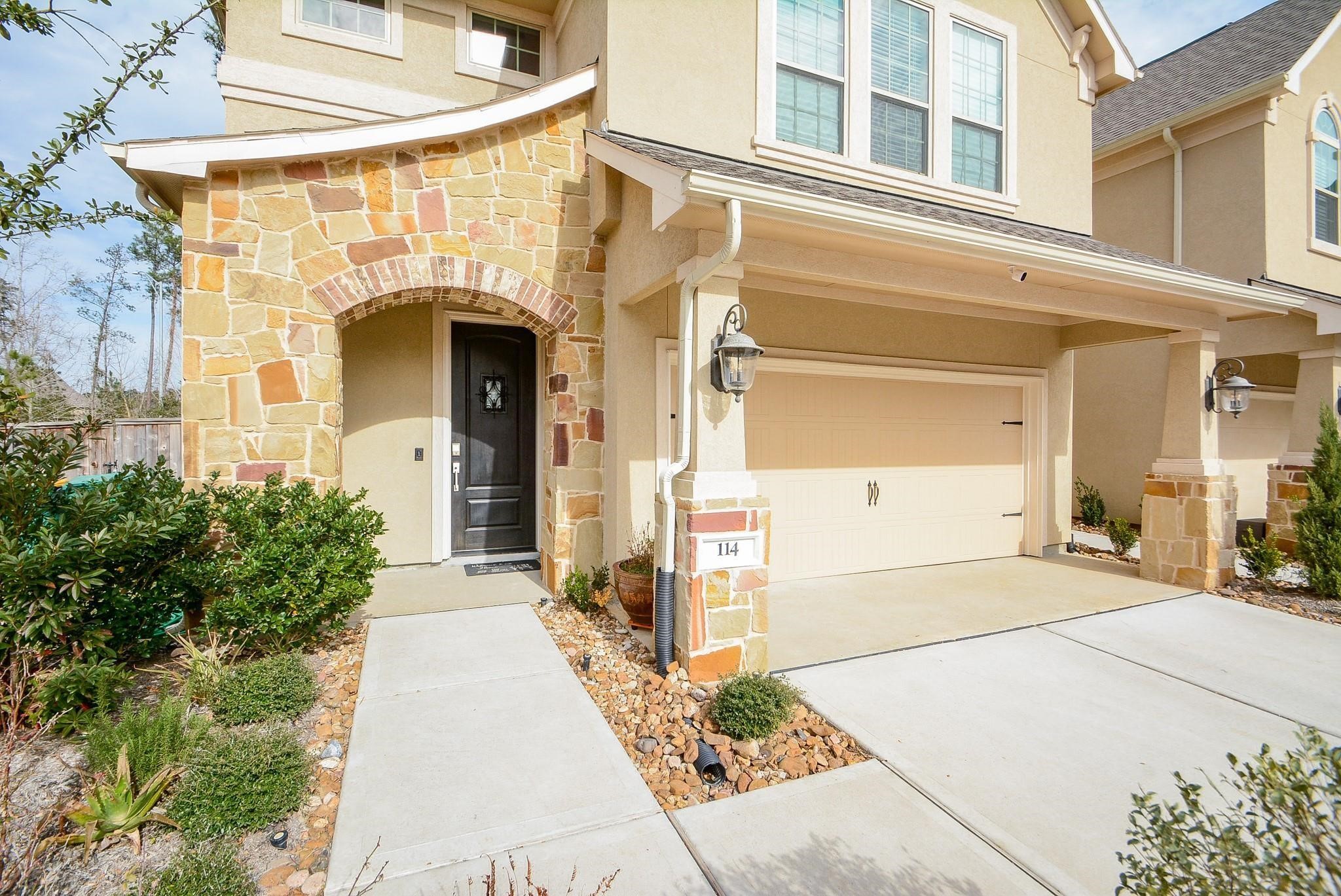 114 Silver Sky Street Conroe, TX 77304 - Photo 2 of 36 a front view of a building