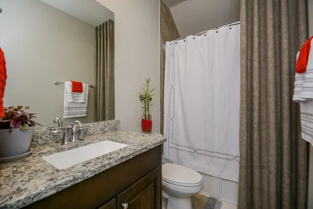 a view of a hallway with windows