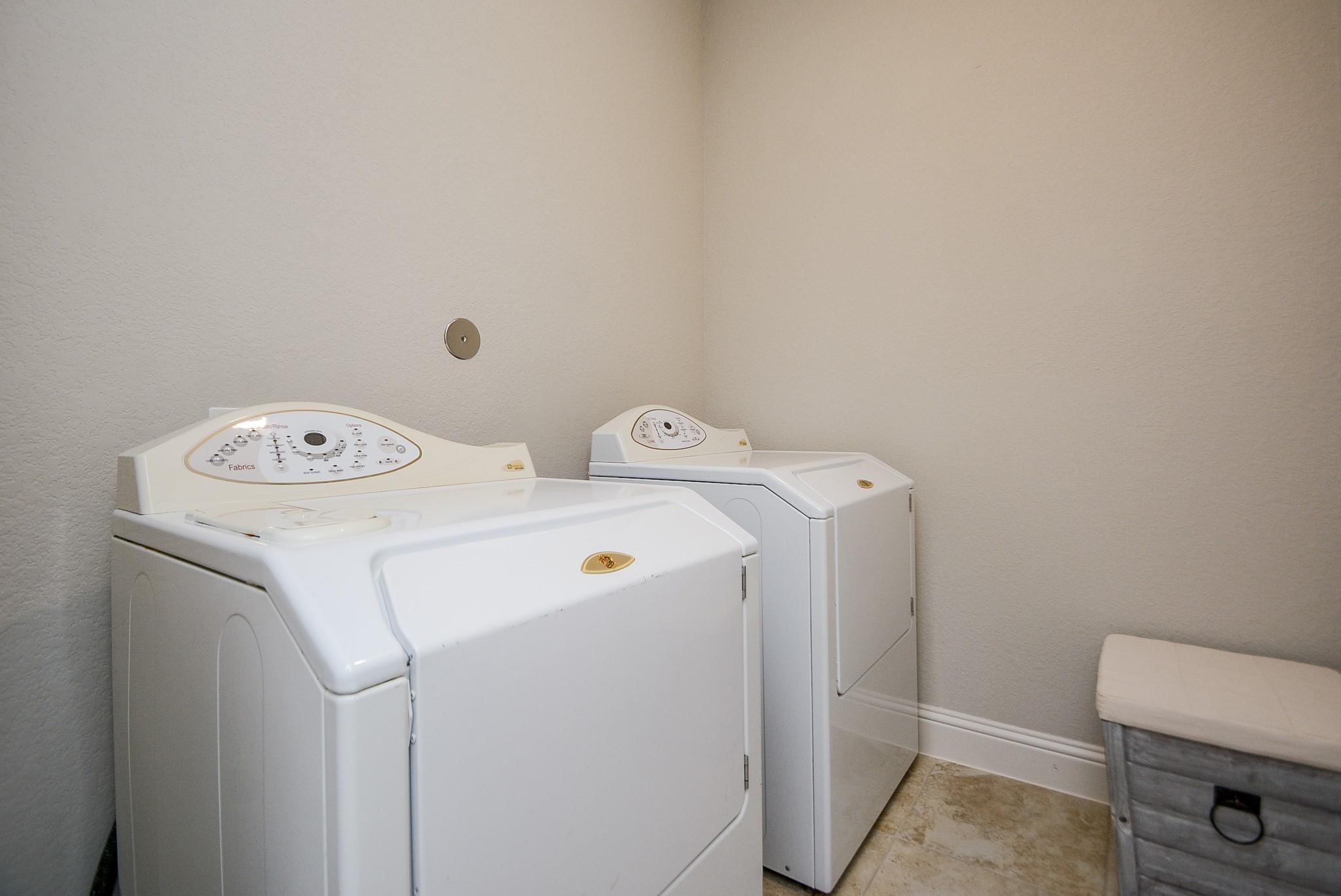 114 Silver Sky Street Conroe, TX 77304 - Photo 31 of 36 a utility room with dryer and washer
