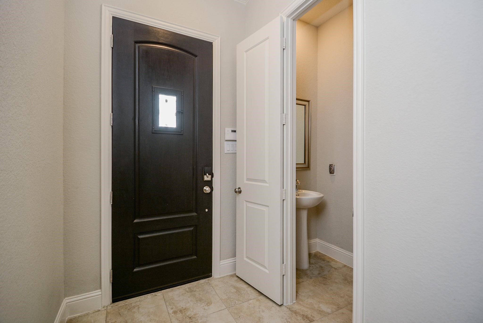 114 Silver Sky Street Conroe, TX 77304 - Photo 4 of 36 a bathroom with a shower