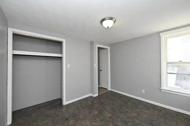 an empty room with windows