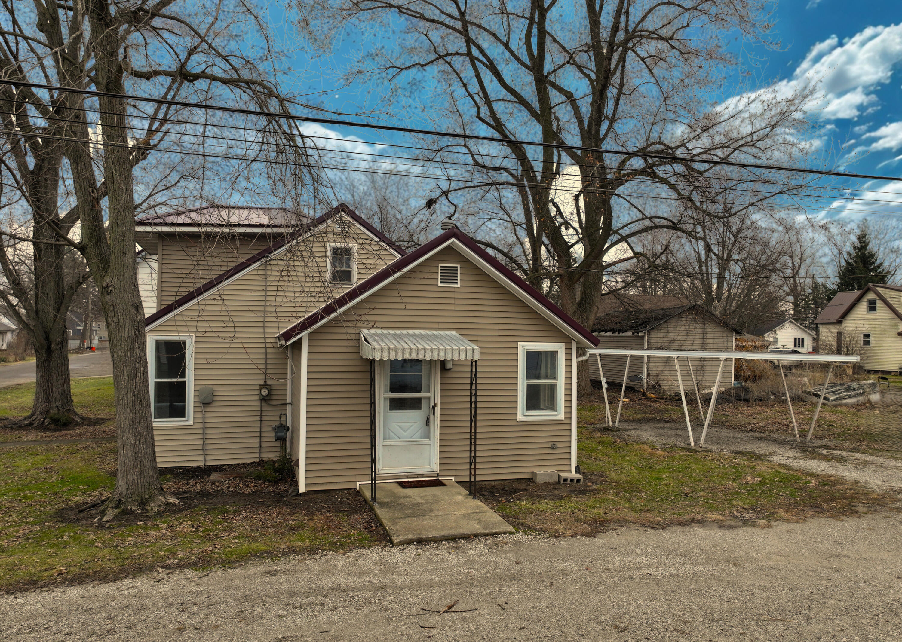 411 West Jefferson Street Winamac, IN 46996 - Photo 2 of 23 a view of a house with a yard