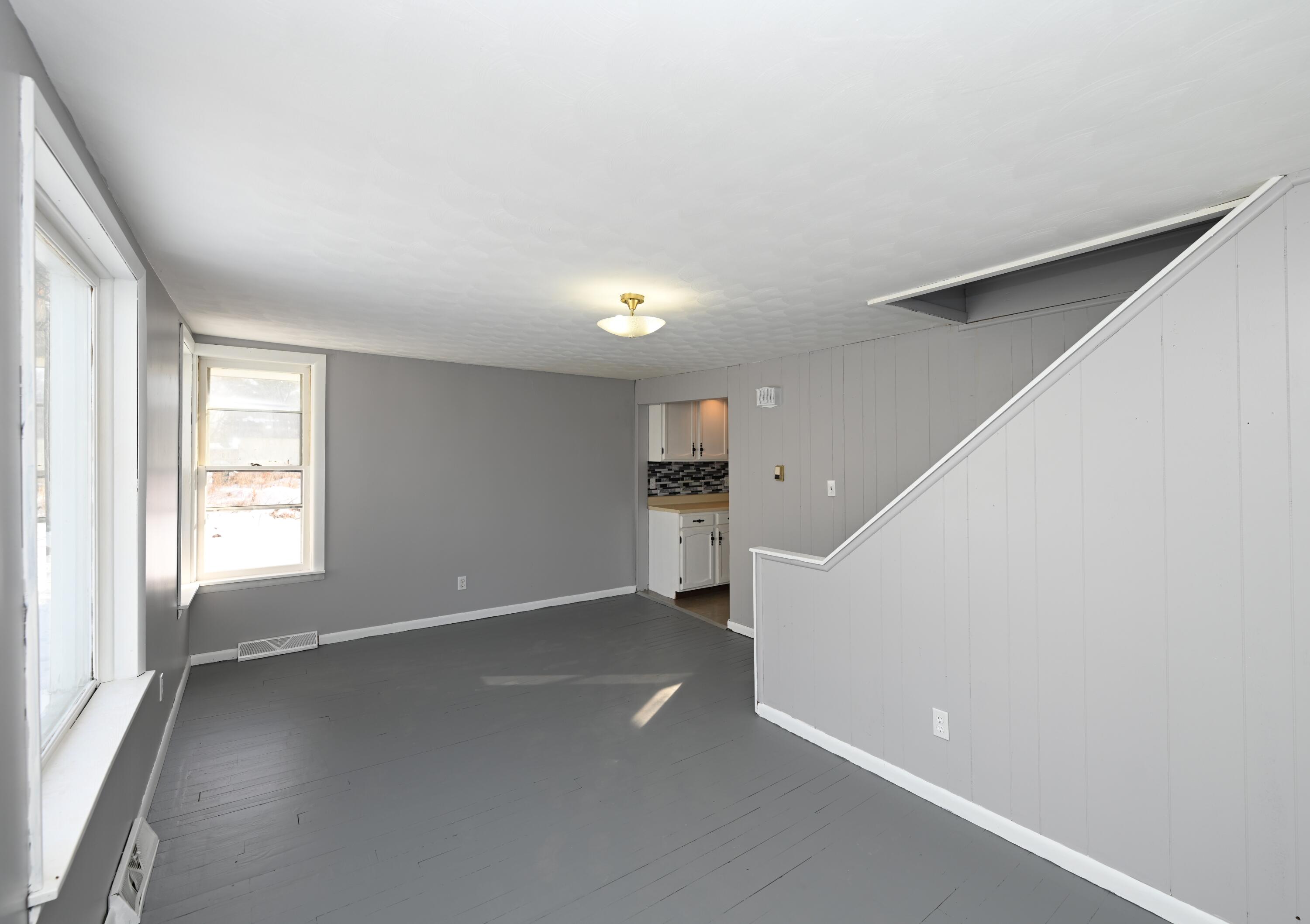 411 West Jefferson Street Winamac, IN 46996 - Photo 6 of 23 a view of an empty room with a window