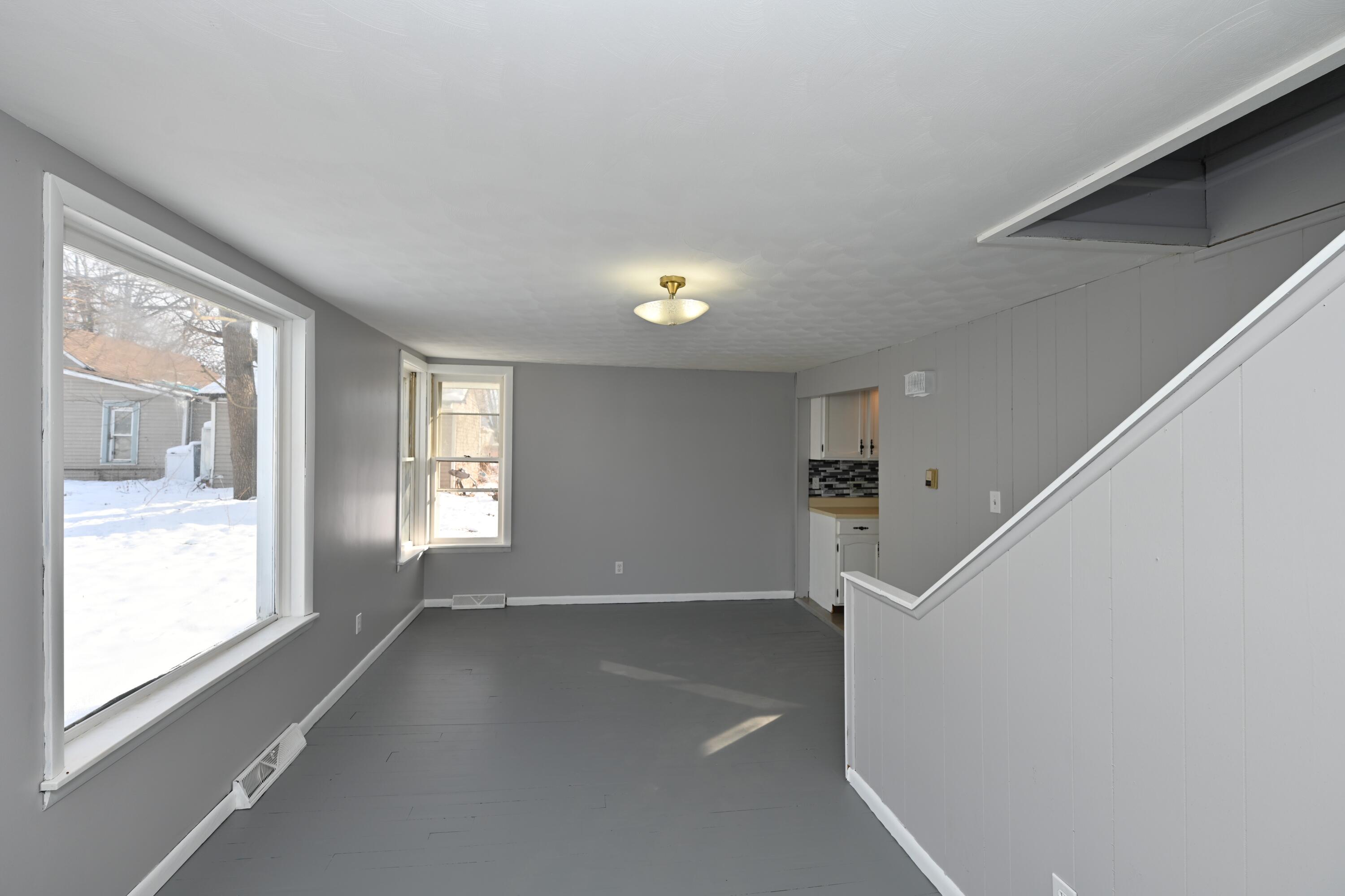 411 West Jefferson Street Winamac, IN 46996 - Photo 7 of 23 a view of an empty room with a window