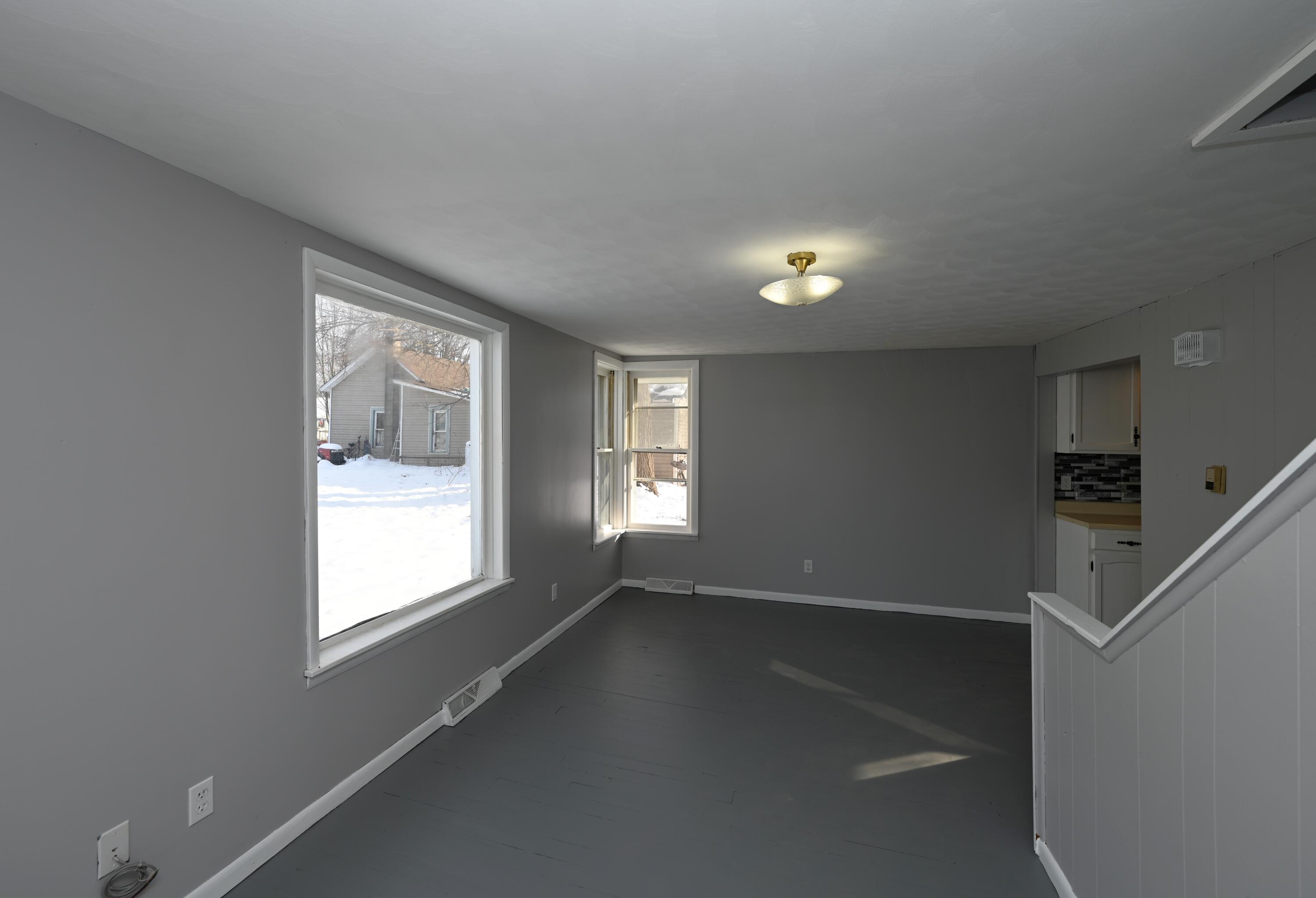 411 West Jefferson Street Winamac, IN 46996 - Photo 8 of 23 a view of an empty room with a window