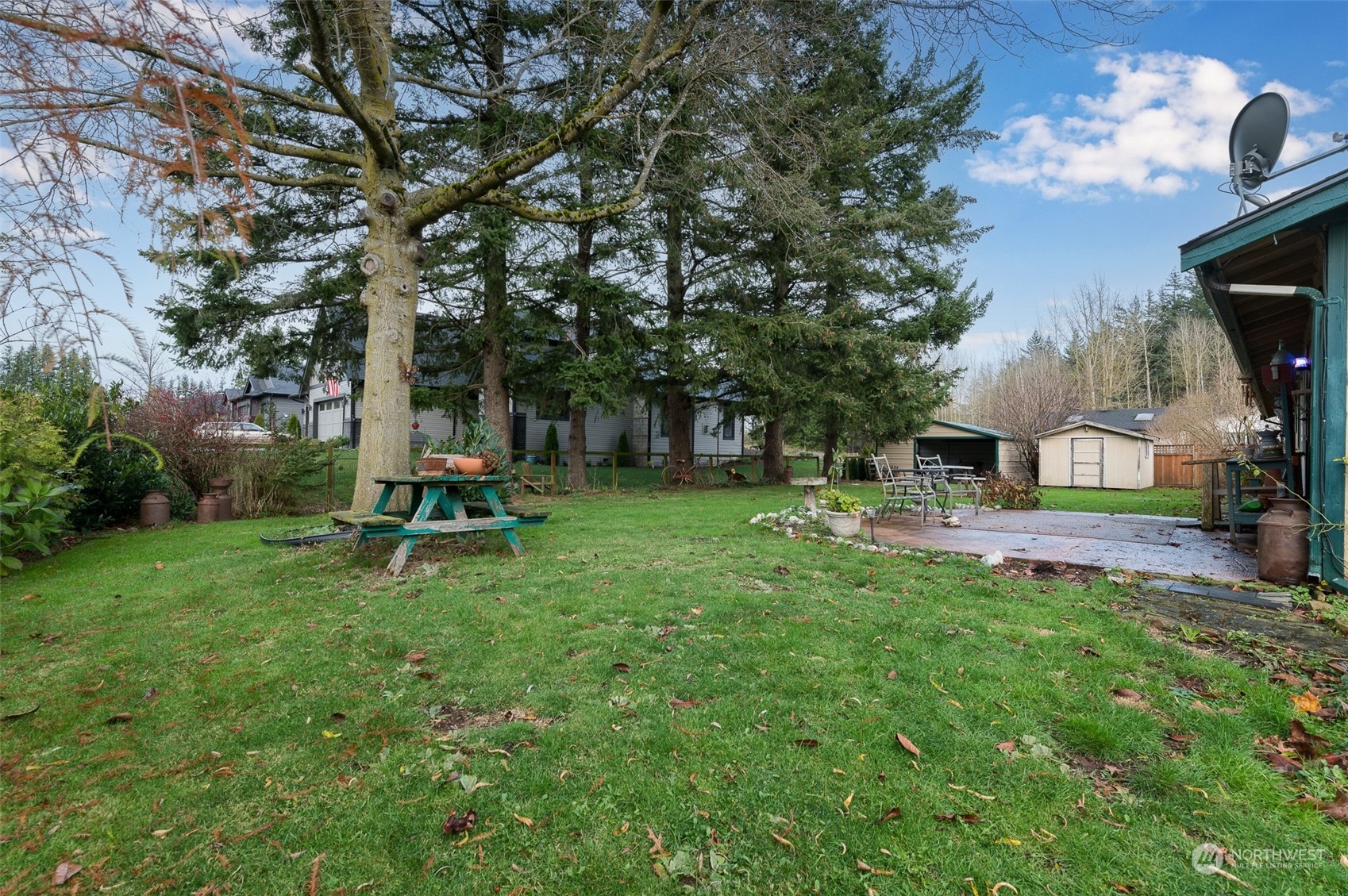 730 East Del Ray Road Lynden, WA 98264 - Photo 34 of 40 a view of a park with slide on wooden deck