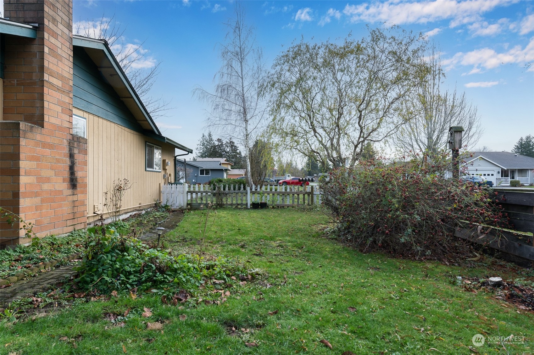730 East Del Ray Road Lynden, WA 98264 - Photo 35 of 40 a view of a house with backyard and garden