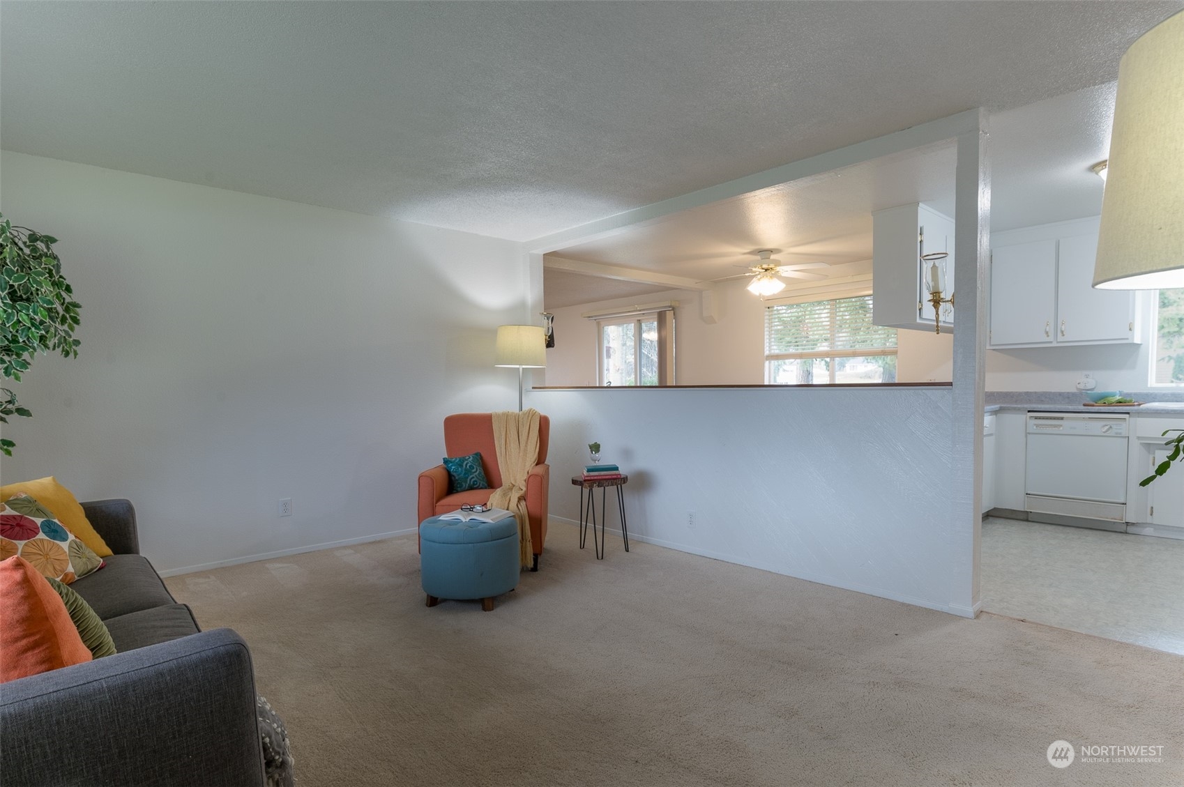 730 East Del Ray Road Lynden, WA 98264 - Photo 9 of 40 a living room with furniture and a potted plant