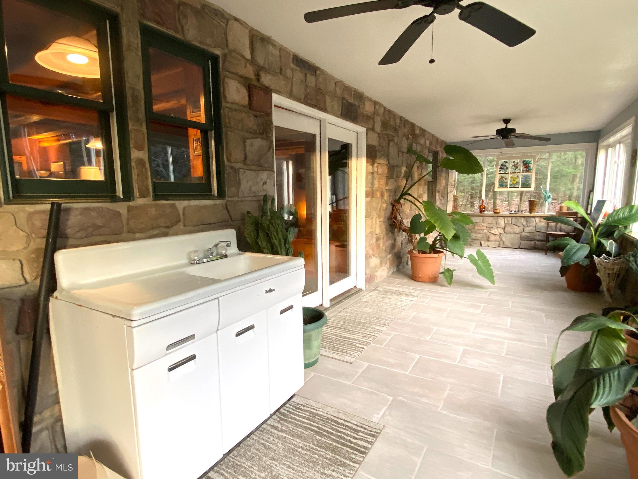 590 Indiana Road Landisburg, PA 17040 - Photo 18 of 128 Sunroom with sink for plant water etc