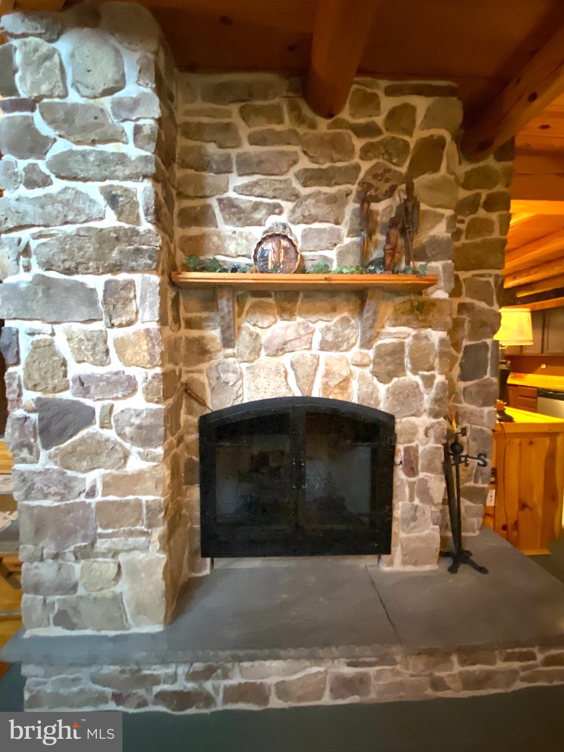 590 Indiana Road Landisburg, PA 17040 - Photo 35 of 128 Propane fireplace centrally located in living area