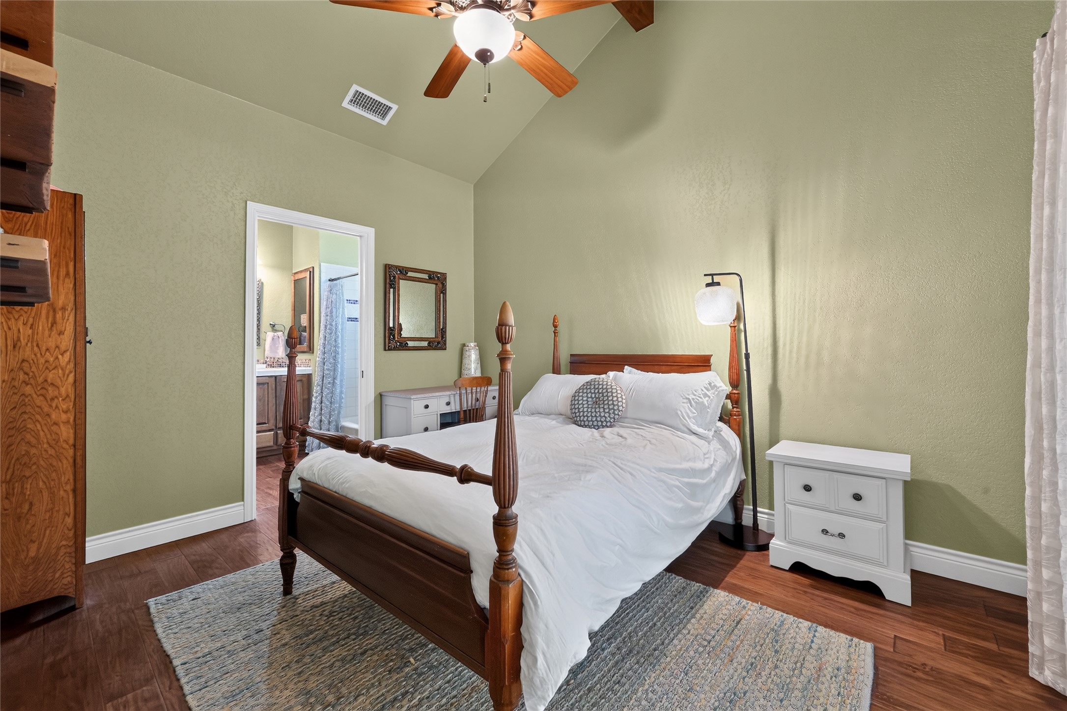 700 Willow Creek Road Salado, TX 76571 - Photo 26 of 39 Bedroom #2, vaulted ceiling with french doors to the front porch and attached full bath.