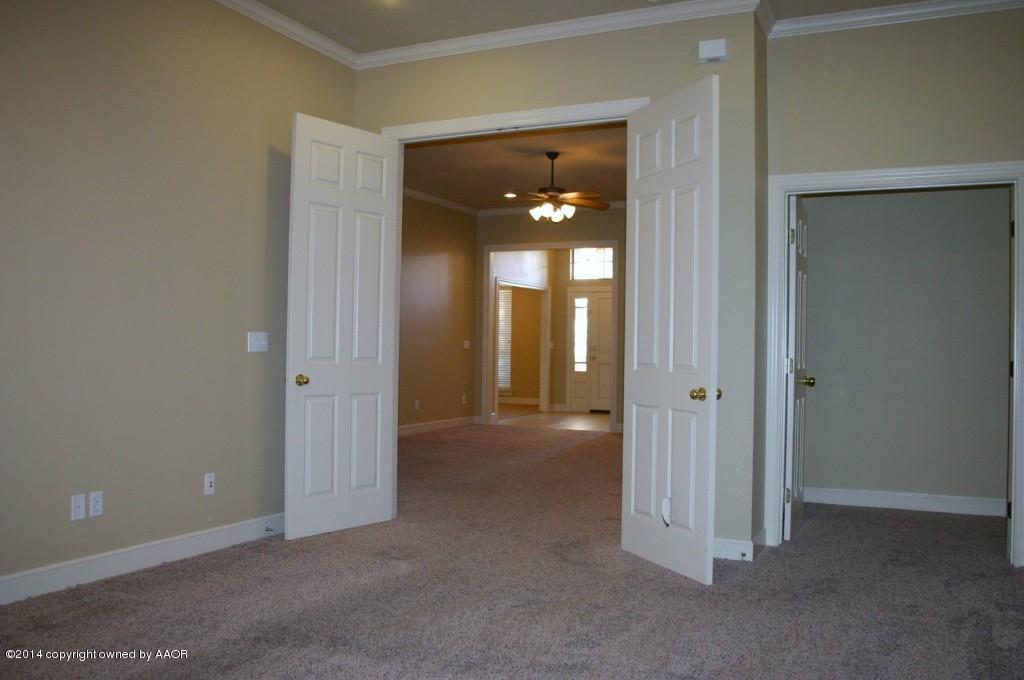 5827 Nicholas Circle Amarillo, TX 79109 - Photo 11 of 23 an empty room with closet and a bathroom