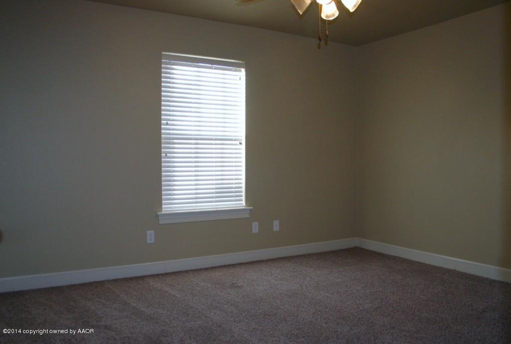5827 Nicholas Circle Amarillo, TX 79109 - Photo 18 of 23 an empty room with a window