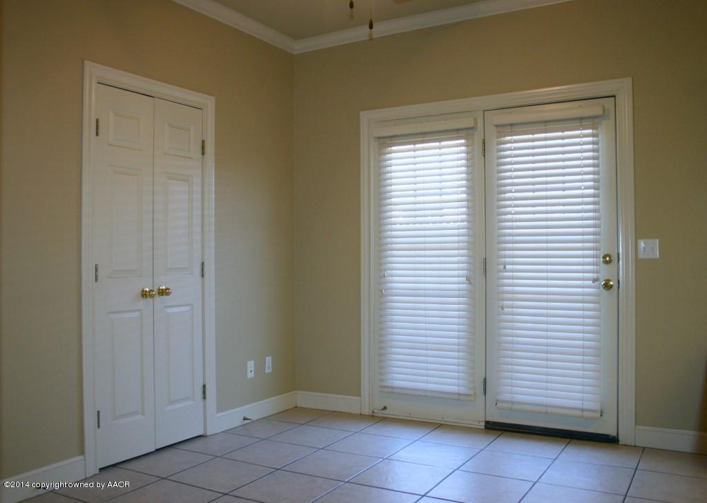 5827 Nicholas Circle Amarillo, TX 79109 - Photo 6 of 23 an empty room with a window