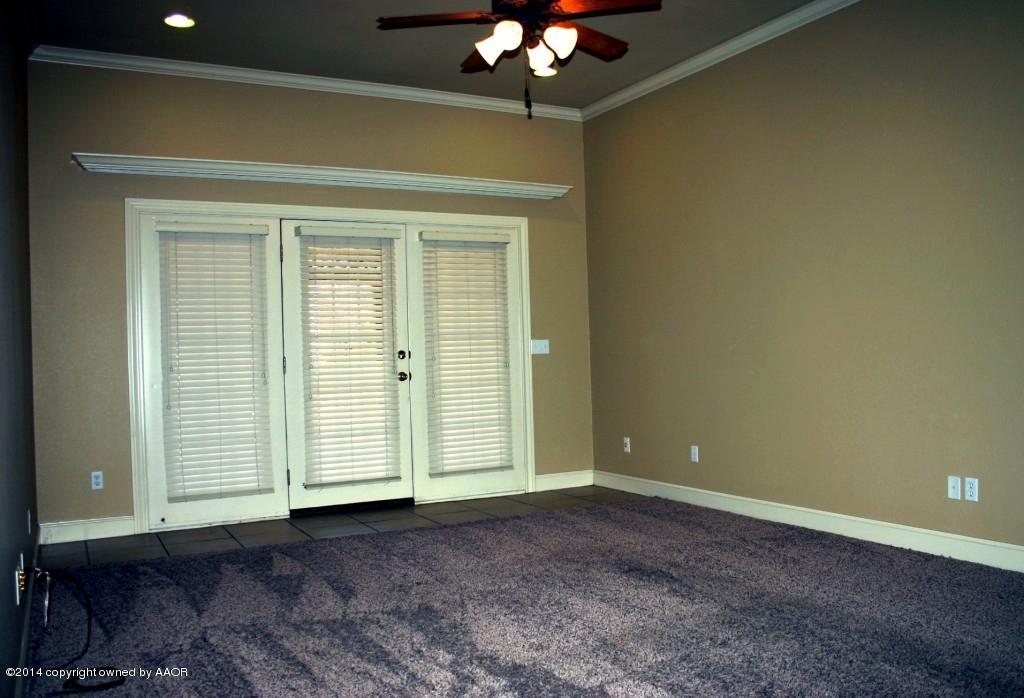 5827 Nicholas Circle Amarillo, TX 79109 - Photo 10 of 23 a view of an empty room with a window