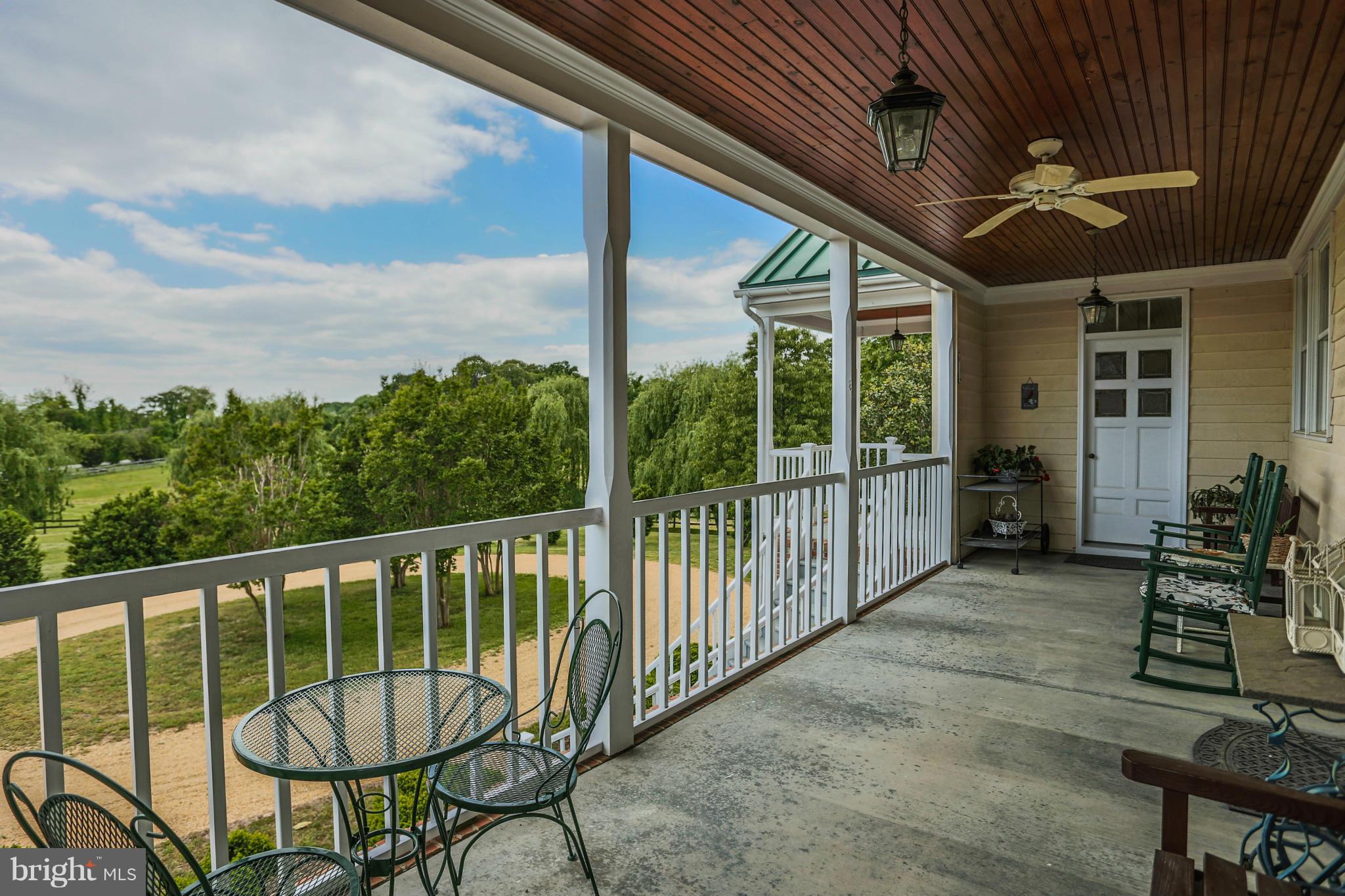2595 Garrity Road St. Leonard, MD 20685 - Photo 8 of 31 a view of a balcony with chairs