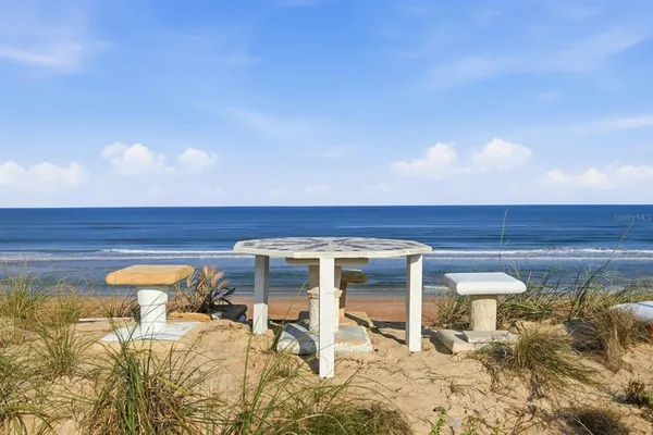 a view of a house with a ocean view