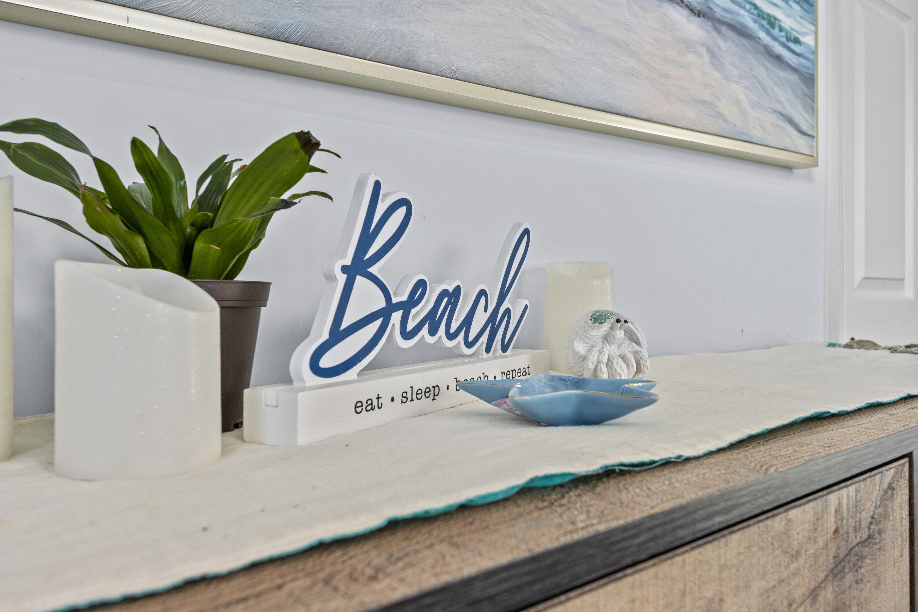 711 South Ocean Drive, Unit B Fort Pierce, FL 34949 - Photo 13 of 21 a close view of dining table with potted plant