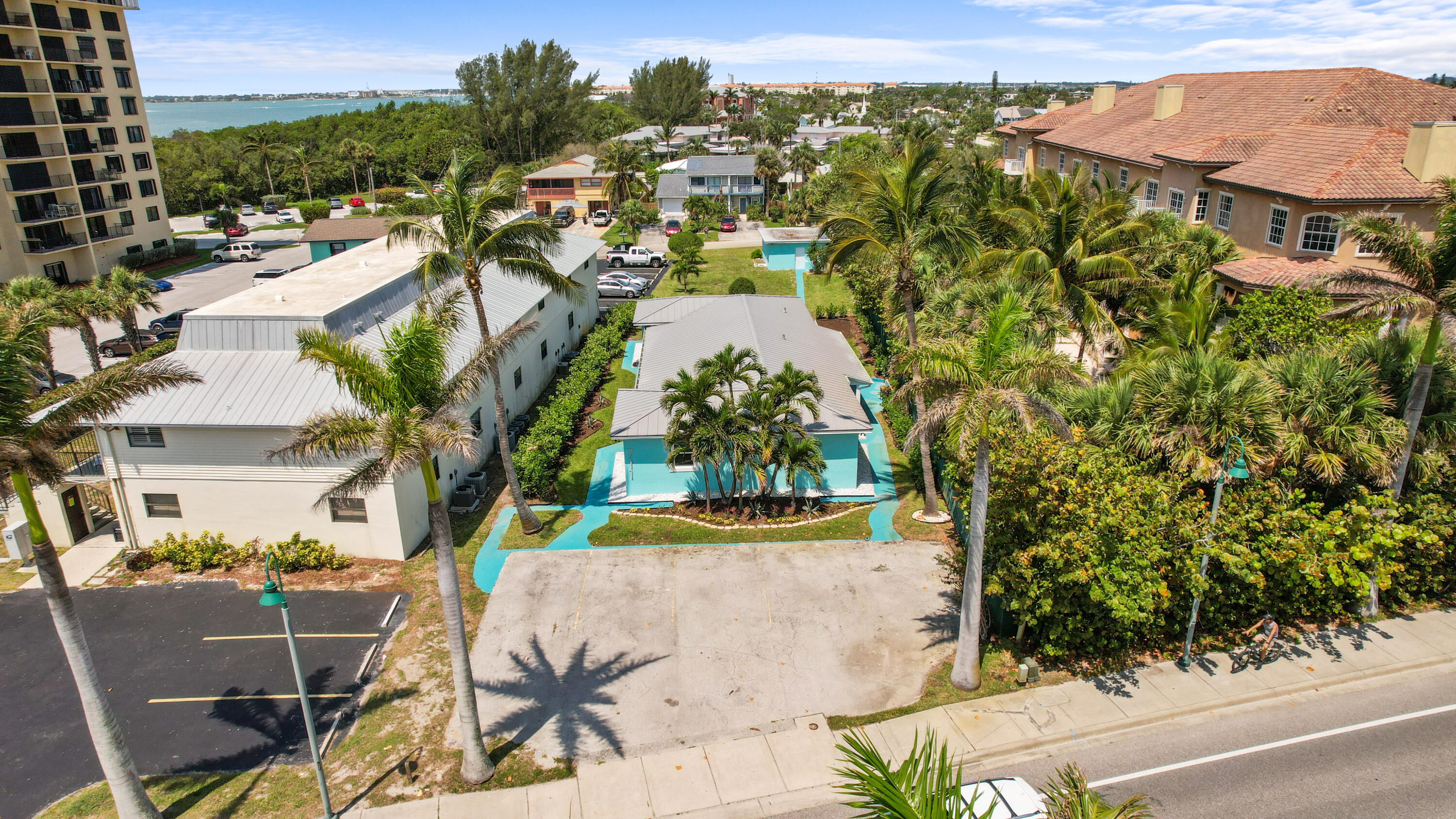 711 South Ocean Drive, Unit B Fort Pierce, FL 34949 - Photo 2 of 21 an aerial view of residential houses with outdoor space and trees