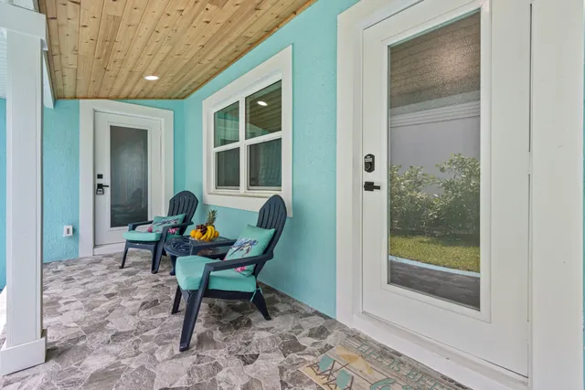 a work room with furniture and windows