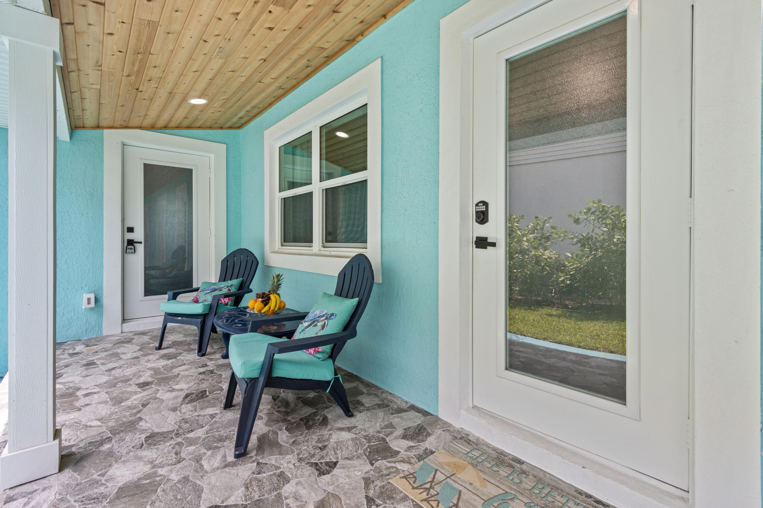 711 South Ocean Drive, Unit B Fort Pierce, FL 34949 - Photo 4 of 21 a work room with furniture and windows