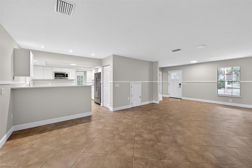 4570 Hidden River Road Sarasota, FL 34240 - Photo 21 of 45 a view of a kitchen with a sink and cabinets