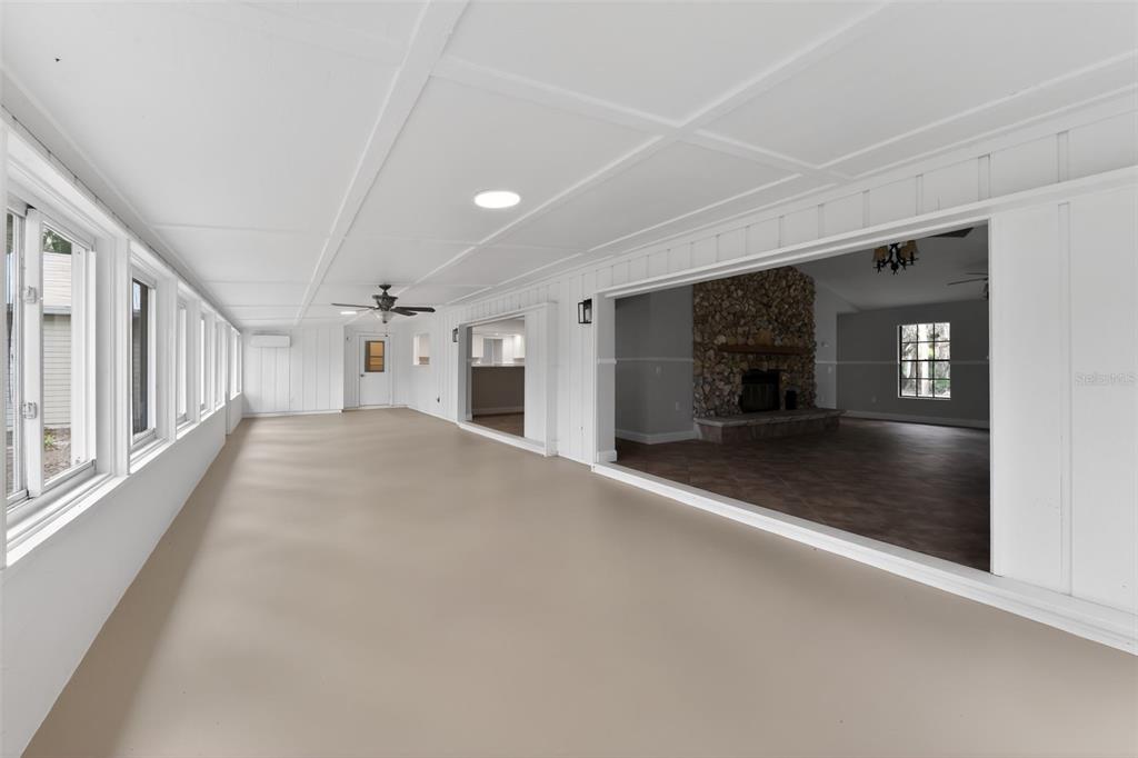 4570 Hidden River Road Sarasota, FL 34240 - Photo 41 of 45 a view of a hallway with an empty room