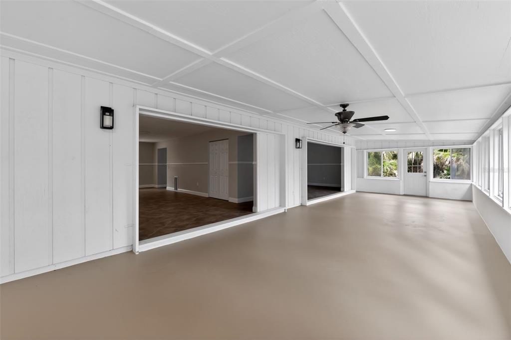 4570 Hidden River Road Sarasota, FL 34240 - Photo 42 of 45 a view of a livingroom with a fireplace and window